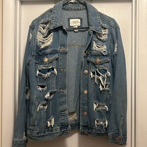 Distressed denim jacket